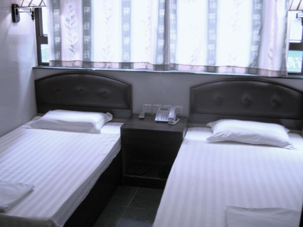 Kowloon Youth Village Tsim Sha Tsui 九龙青年公寓 Hongkong Szoba fotó